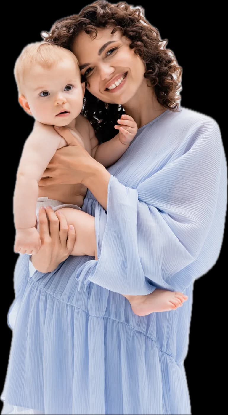 A mother holding her baby close